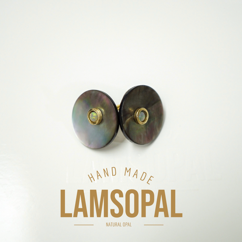 Two round Lamsopal natural opal stud earrings with iridescent green and purple tones and gold settings, displayed on a clean white background with 'HAND MADE LAMSOPAL' text below.