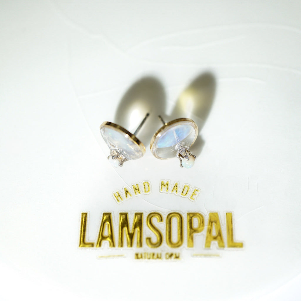 A pair of Lamsopal handmade natural opal stud earrings with gold-toned settings, displayed on a white background with the brand name 'LAMSOPAL' printed below.