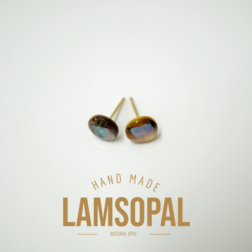 A pair of handmade Lamsopal natural opal stud earrings with gold posts, displayed on a clean white background with gold text below reading 'HAND MADE LAMSOPAL NATURAL OPAL'.