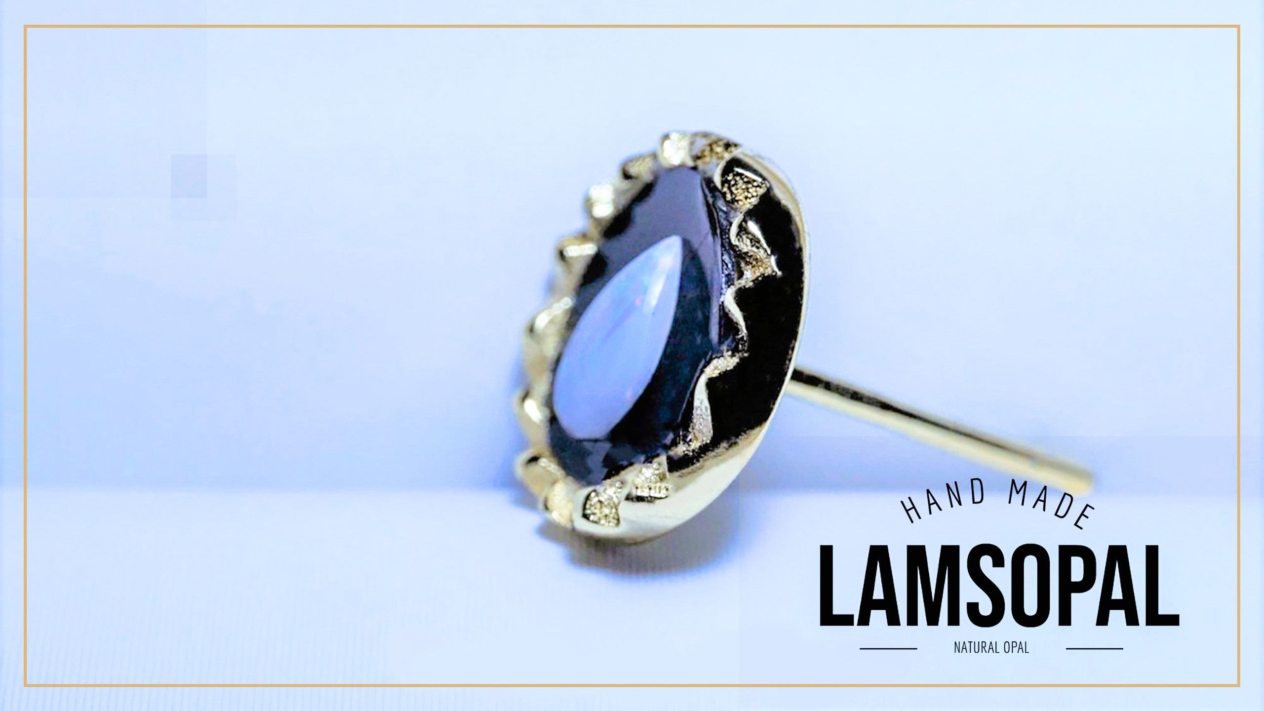 A single Lamsopal hand-made natural opal stud earring with a gold-toned bezel setting, shown on a light blue background with a brand logo overlay.