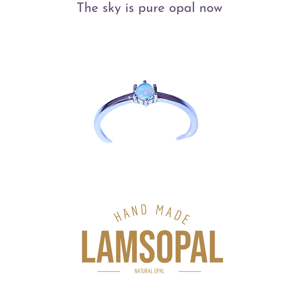 LAMSOPAL opal ring with 'Opal Sky Collection' text on a white background