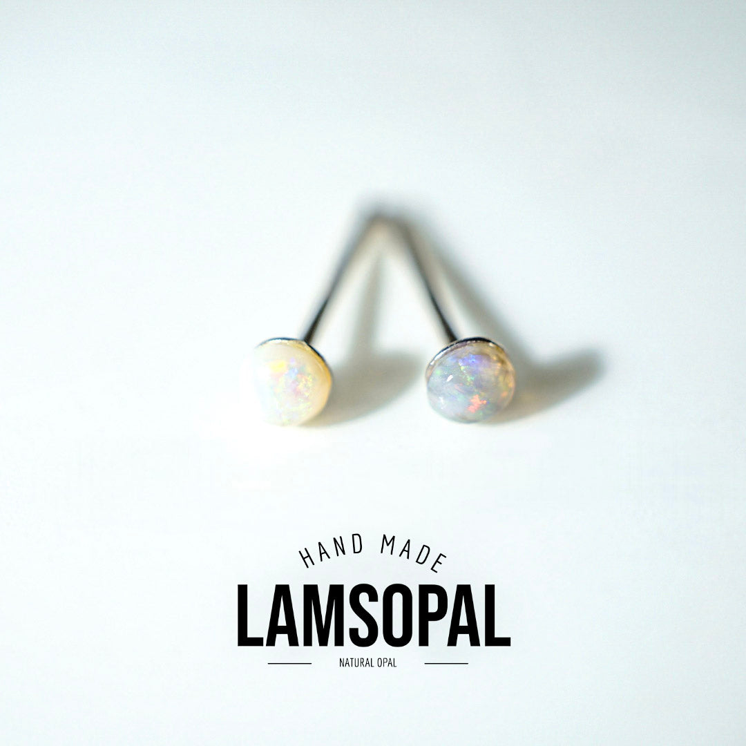 Two natural opal stud earrings with black posts, displayed on a clean white background with a logo overlay that reads 'HAND MADE LAMSOPAL NATURAL OPAL'.