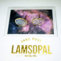 A pair of oval natural opal stud earrings with gold-toned bezel settings, displayed on a white card above a printed brand card that reads 'HAND MADE LAMSOPAL'.