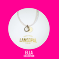 A delicate necklace with a clear beaded chain and a double charm consisting of a gold ring and a flat gold disc, presented on a white circular card with the brand name 'Lamsopal' and collection 'Ella Collection' on a vibrant pink background.