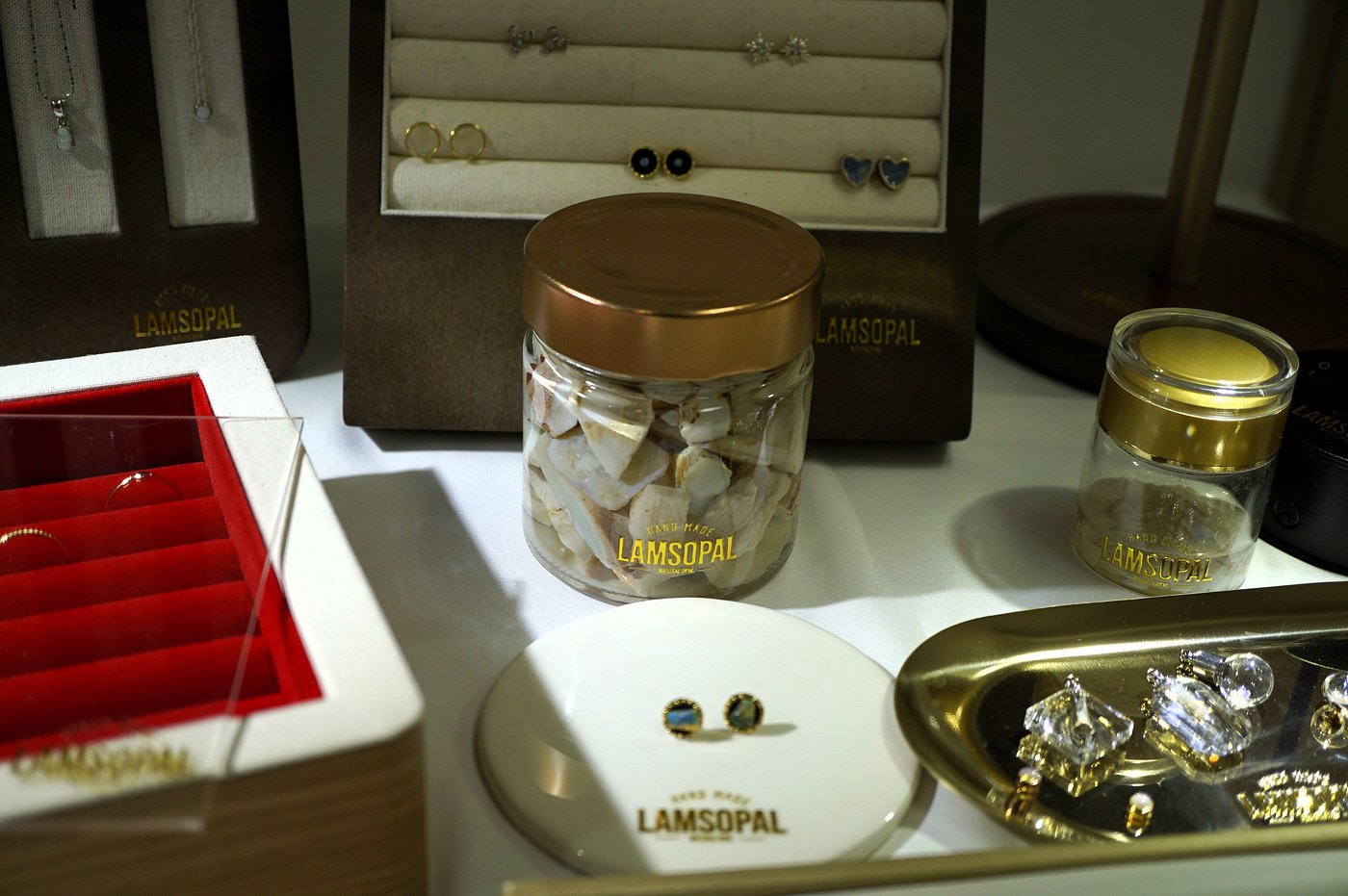 LamsOpal Jewellery Collection with natural opal gemstones from Coober Pedy, handmade earrings and pendant necklaces