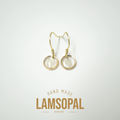 A pair of gold-tone drop earrings with circular natural opal charms, displayed on a clean white background with a gold 'LAMSOPAL' brand logo and 'HAND MADE' text below.