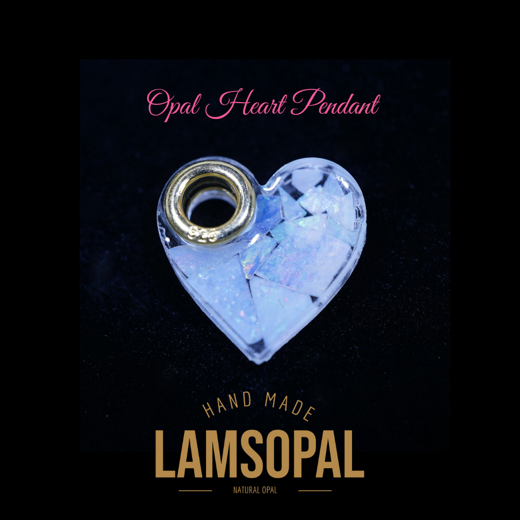 Heart-shaped opal pendant with 'LAMSOPAL' branding on a black background