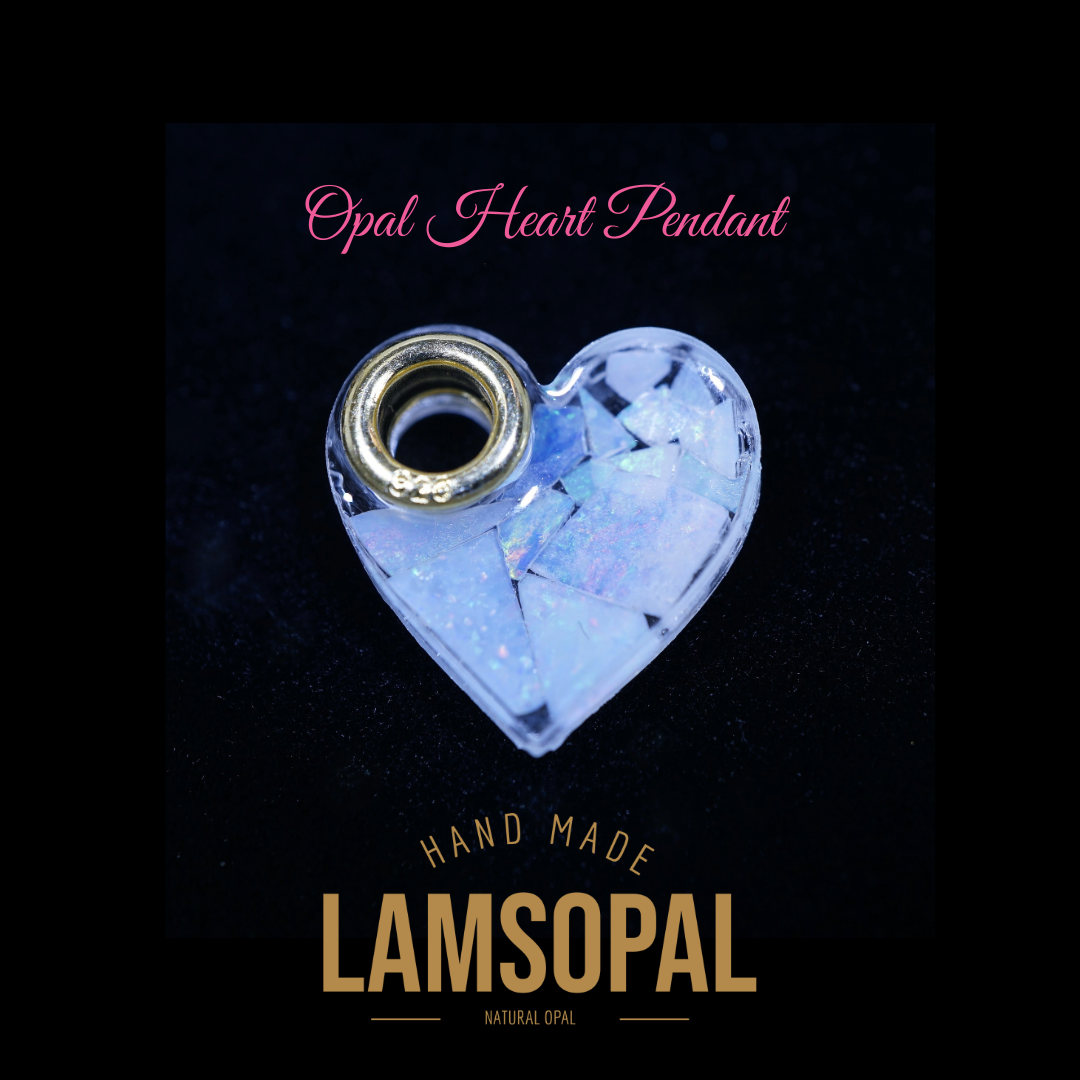 Heart-shaped opal pendant with 'LAMSOPAL' branding on a black background