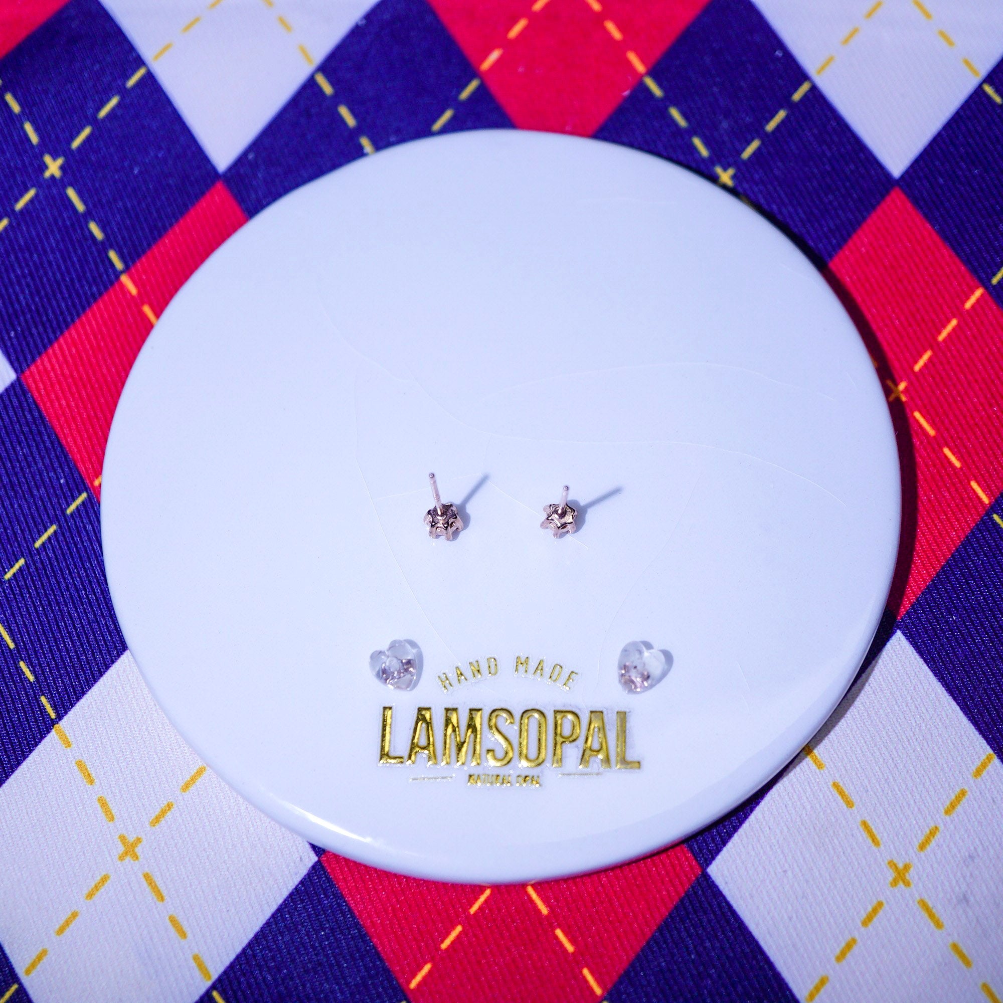 Pair of earrings on a LAMSOPAL Jewellery with heart shaped back