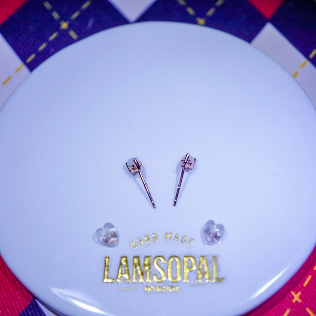 Teardrop Opal Earrings with heart shaped backon a LAMSOPAL Jewellery branded stand 