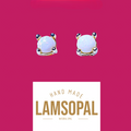 A pair of Lamsopal handmade natural opal stud earrings with gold and silver settings, displayed on a vibrant magenta background with a white brand label below.