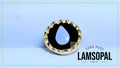A handmade Lamsopal ring featuring a large natural opal teardrop inlay surrounded by a black and gold textured border, set against a light blue background with a brand logo overlay.