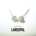 A pair of handmade stud earrings with round, milky white opal gemstones on silver posts, displayed on a clean white background with a 'LAMSOPAL' brand logo overlay at the bottom.