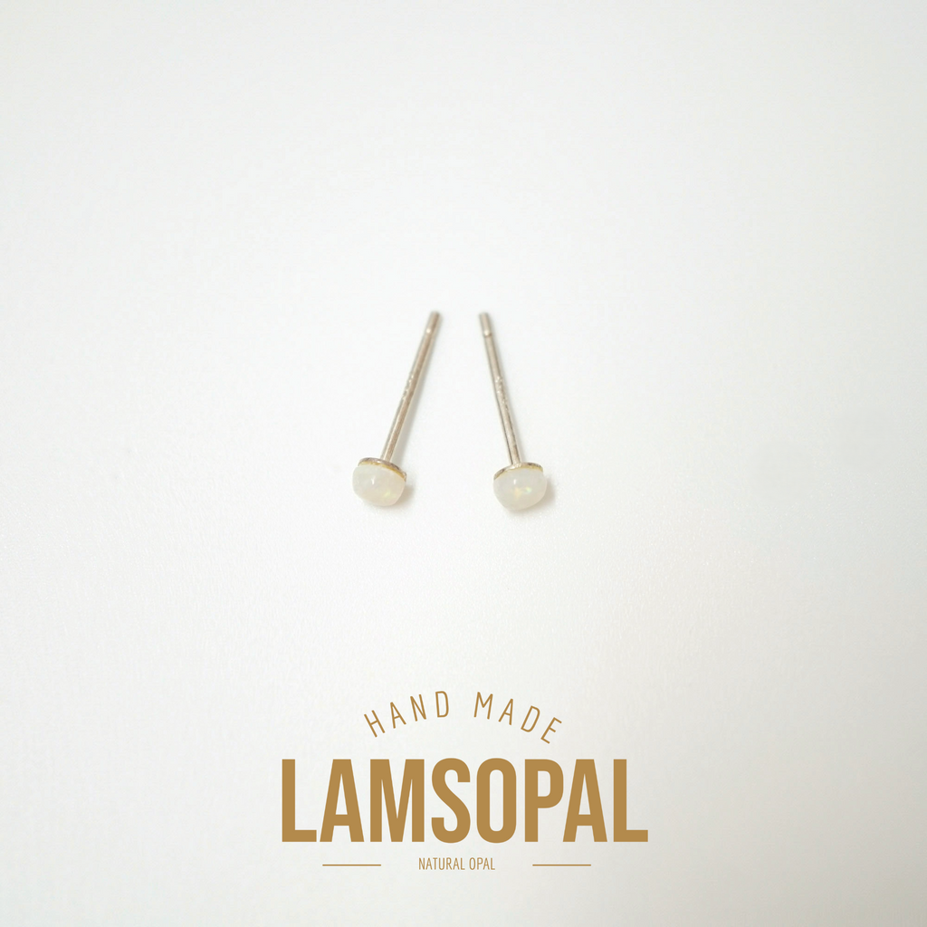 A pair of natural opal stud earrings with silver posts, displayed on a clean white background with a gold 'LAMSOPAL HAND MADE' logo overlay at the bottom.