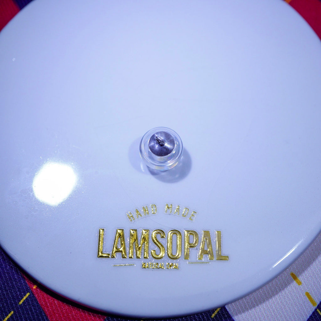 Close-up of a LAMSOPAL floating opal pendant 