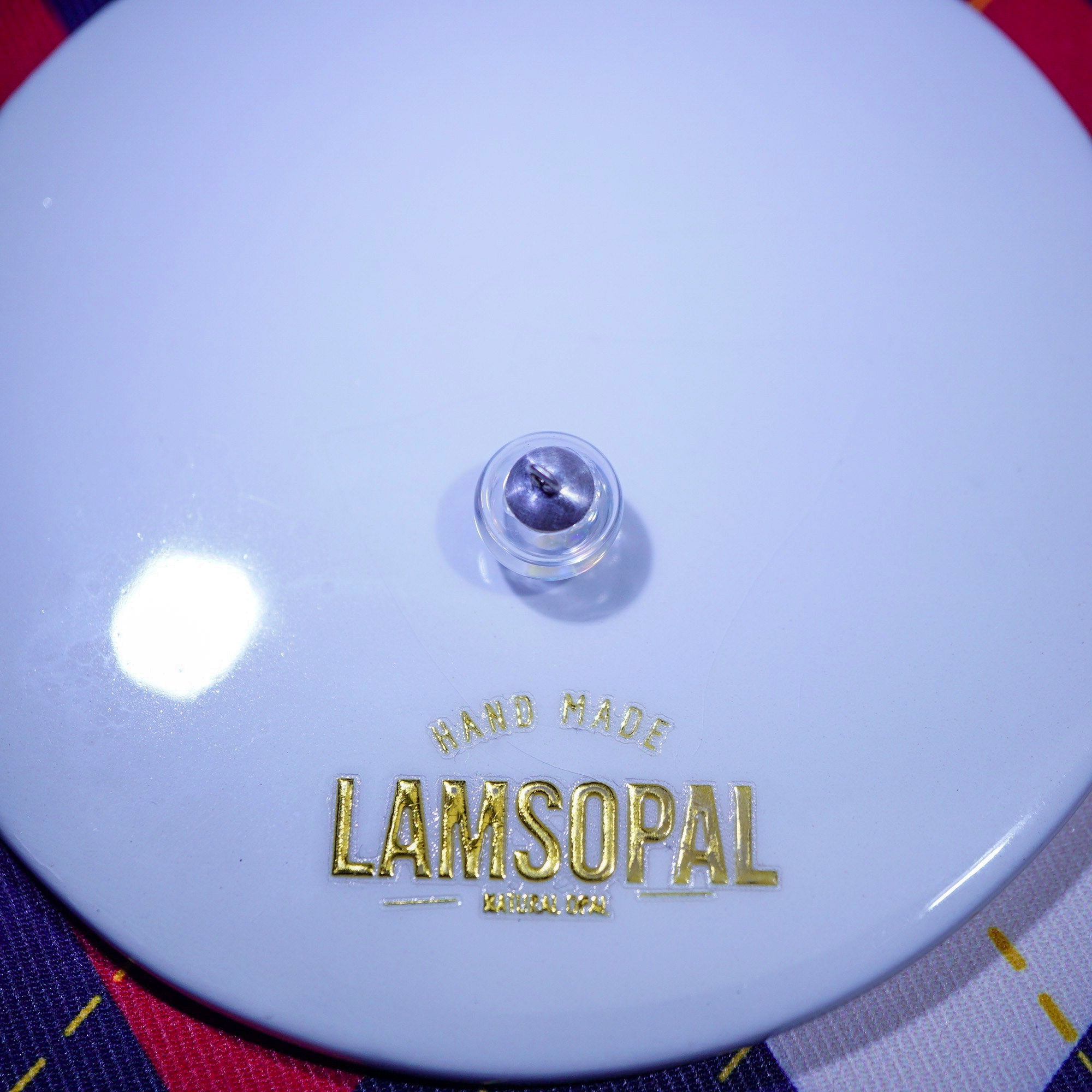 Close-up of a LAMSOPAL floating opal pendant 